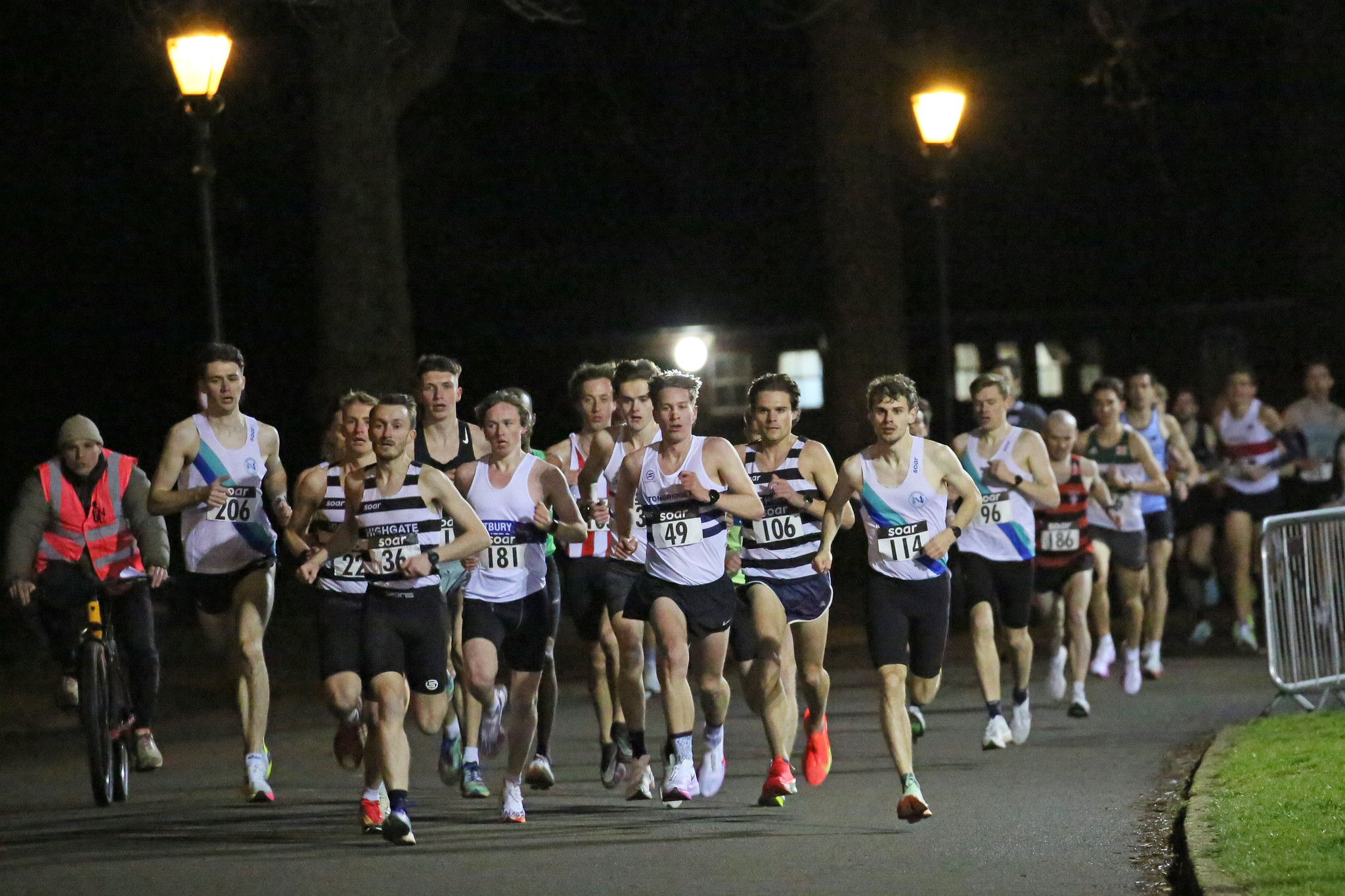 Runners racing at Friday Night Under the Lights 5K